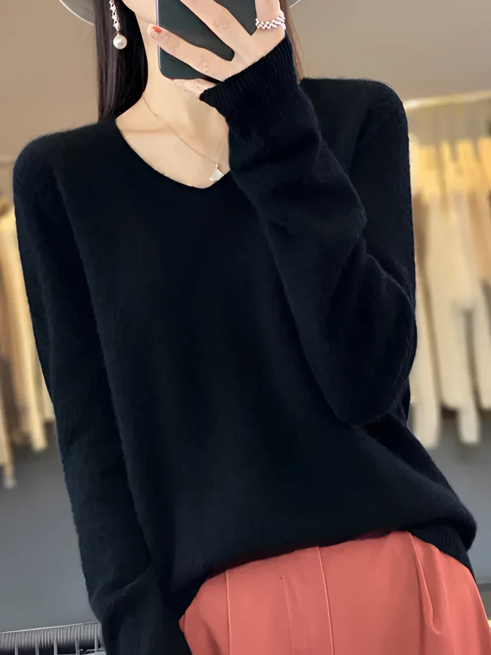 Women's long-sleeve crew neck knit sweater with ribbed cuffs and hem