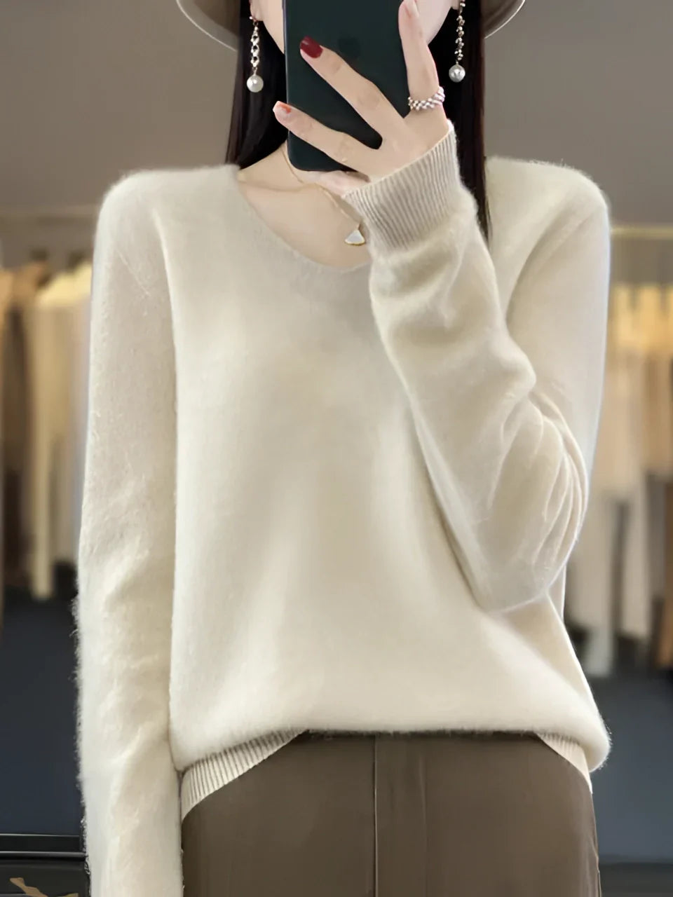Women's long-sleeve crew neck knit sweater with ribbed cuffs and hem