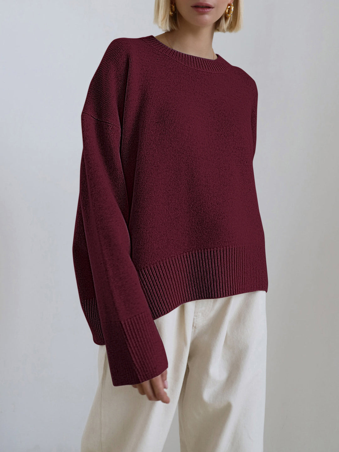 Women's oversized crewneck knitted sweater with long sleeves and ribbed trims
