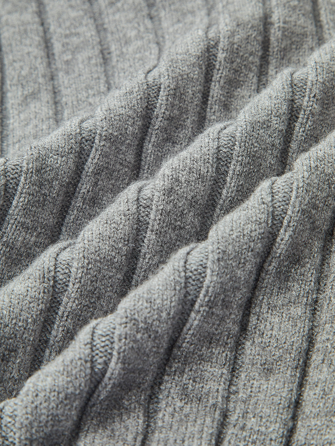 Women's grey ribbed long-sleeve top with collared blue shirt layer and front pockets