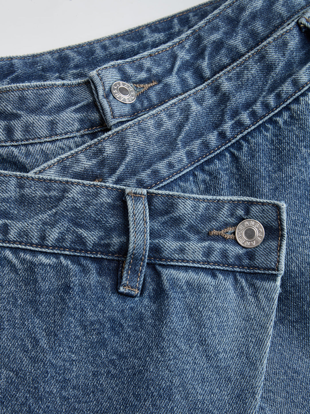 Blue women's cross-front wide-leg cropped jeans with button waistband and cargo pocket