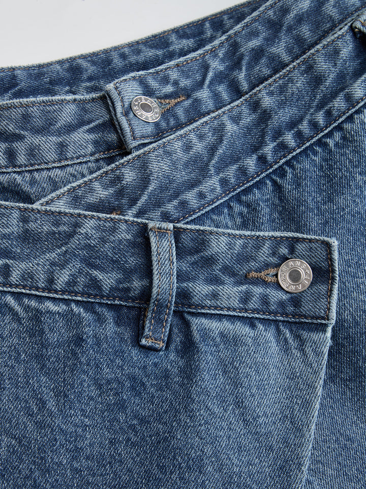 Blue women's cross-front wide-leg cropped jeans with button waistband and cargo pocket