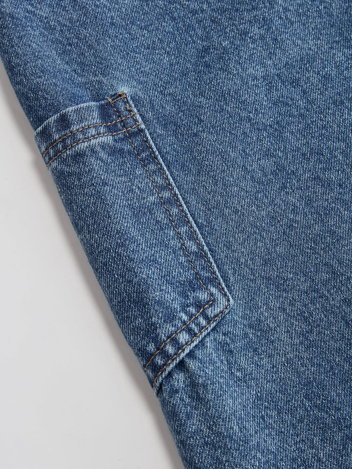 Blue women's cross-front wide-leg cropped jeans with button waistband and cargo pocket