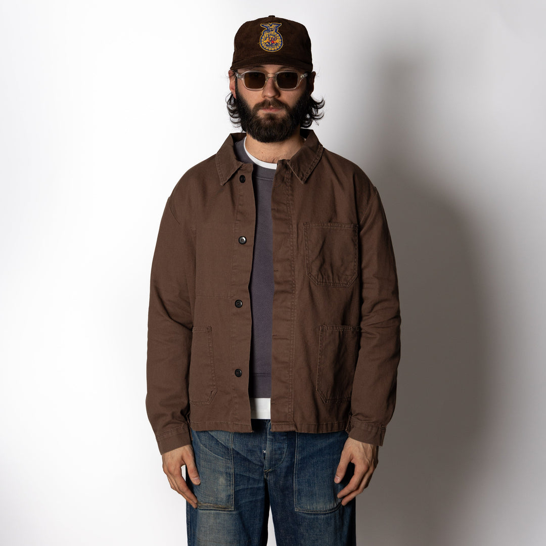 Men's brown utility jacket with button front and four patch pockets