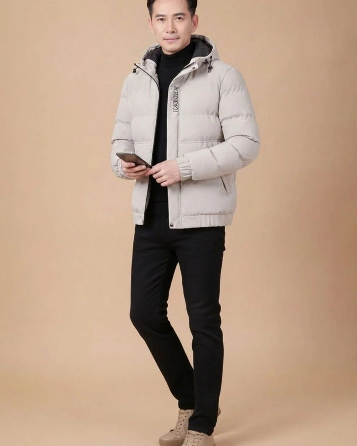 Men's hooded padded jacket with quilted panels and long sleeves