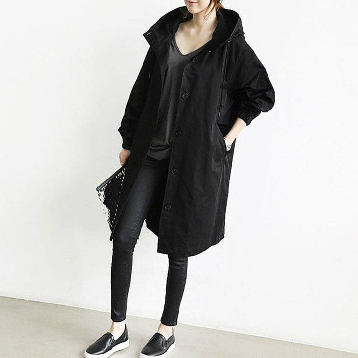 Women's hooded trench coat with button front and side pockets