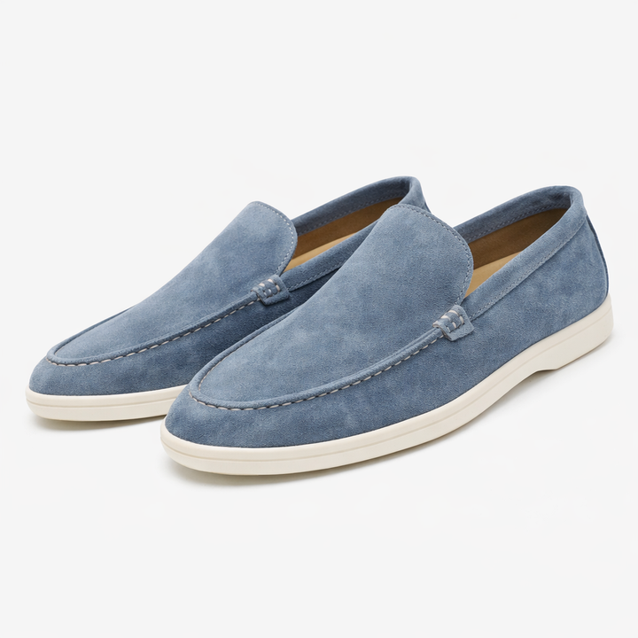 Men's burgundy Como loafer with cream sole and moccasin stitching, shown from the side