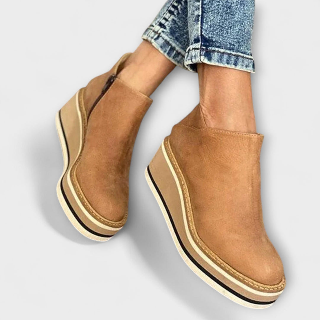 Chelsea ankle boots with side zip and layered platform sole