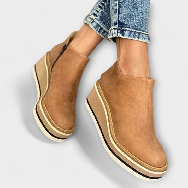 Chelsea ankle boots with side zip and layered platform sole