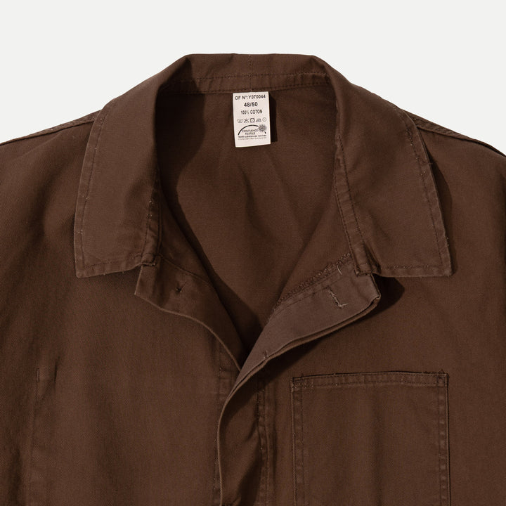 Men's brown utility jacket with button front and four patch pockets
