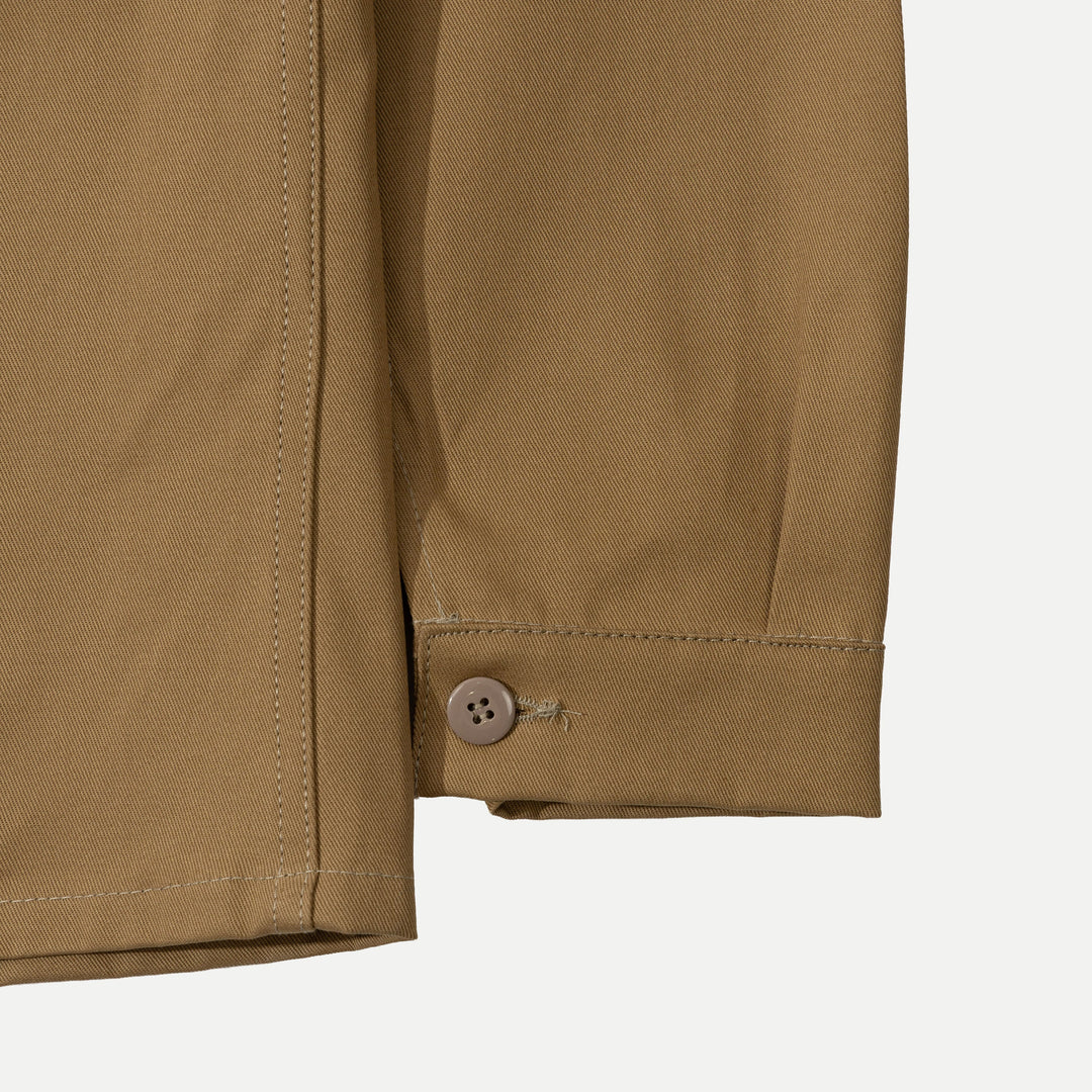 Men's brown utility jacket with four patch pockets