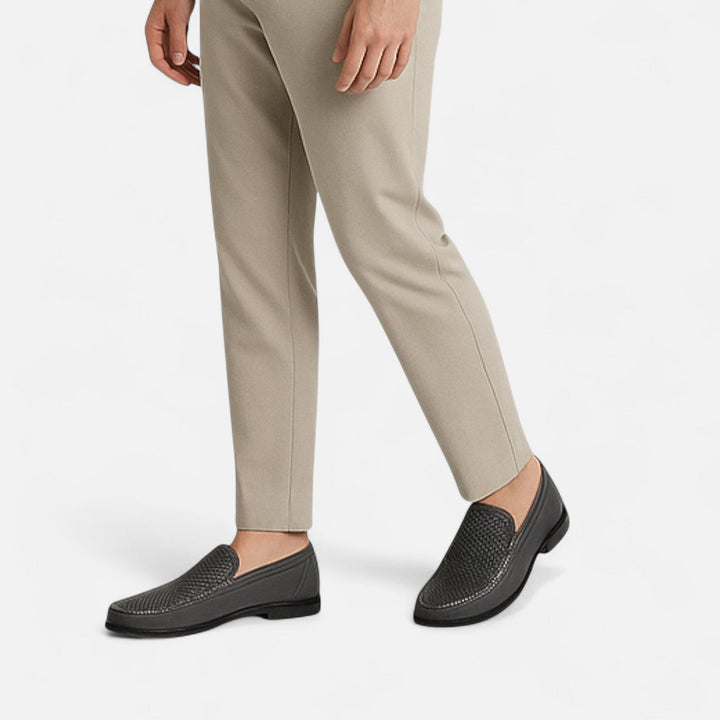 Men's slip-on loafers with perforated moc toe and low heel