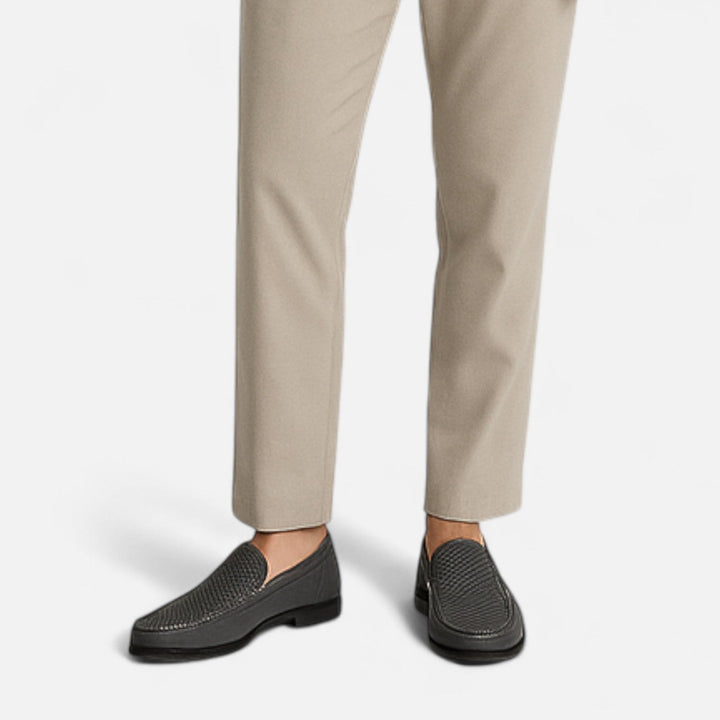 Men's slip-on loafers with perforated moc toe and low heel