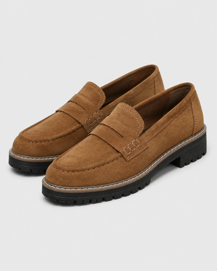 Women's penny loafers with rounded toes and lug soles