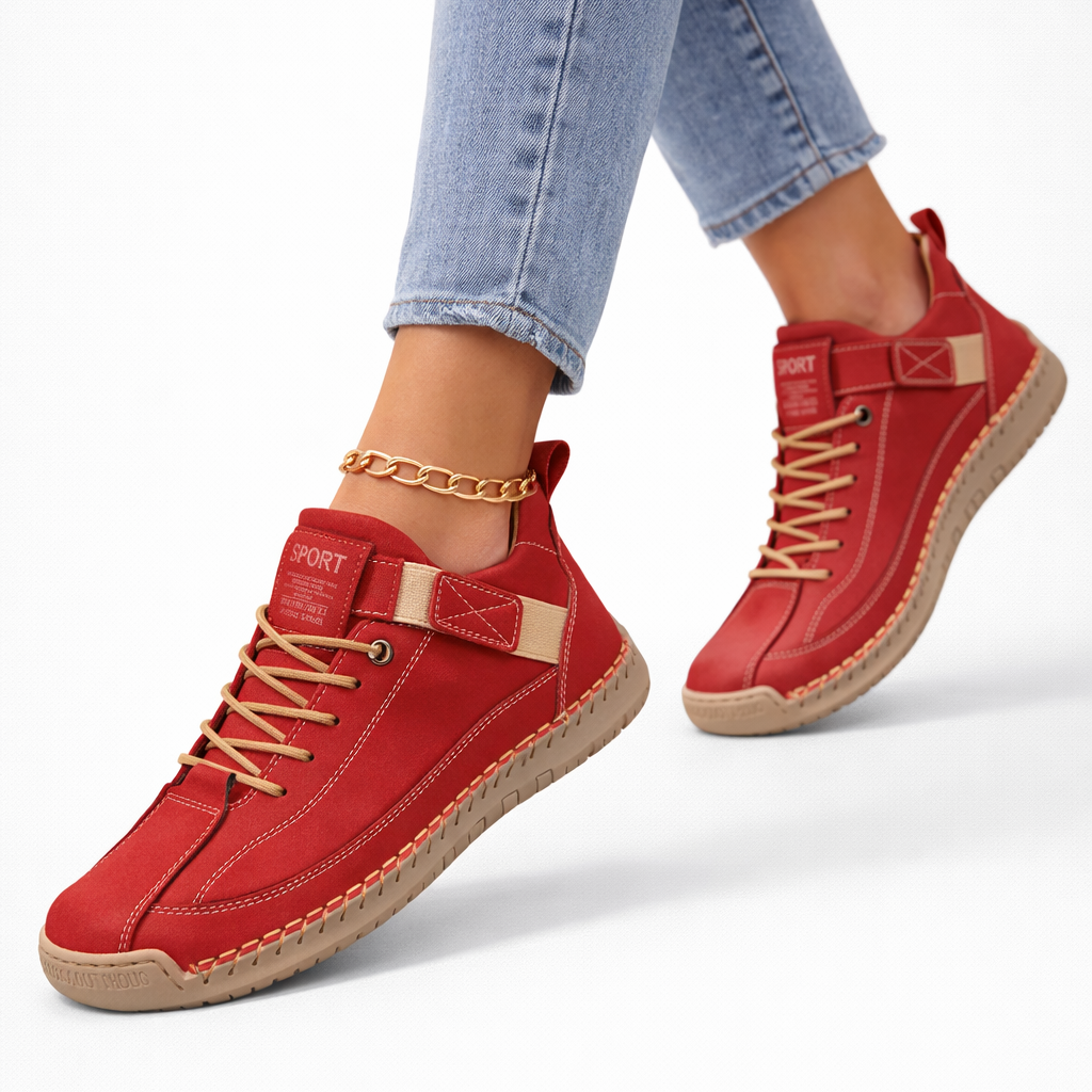 Women's low-top lace-up sneakers with stitched panels, strap detail and flat textured soles