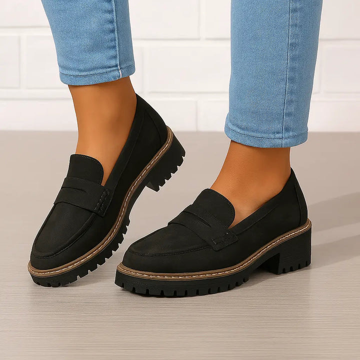 Women's chunky penny loafers with raised vamp straps and lugged soles
