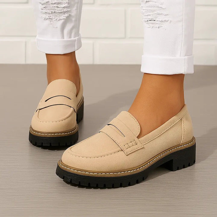 Women's chunky penny loafers with raised vamp straps and lugged soles