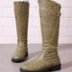 Women's knee-high boots with buckle strap, side zipper and lug sole