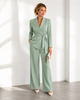 Women's two-piece outfit set with wrap blazer and straight-leg trousers in green and beige