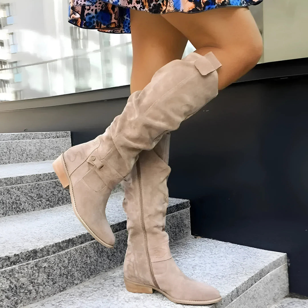 Women's slouch knee-high boots with low block heel and ankle strap details