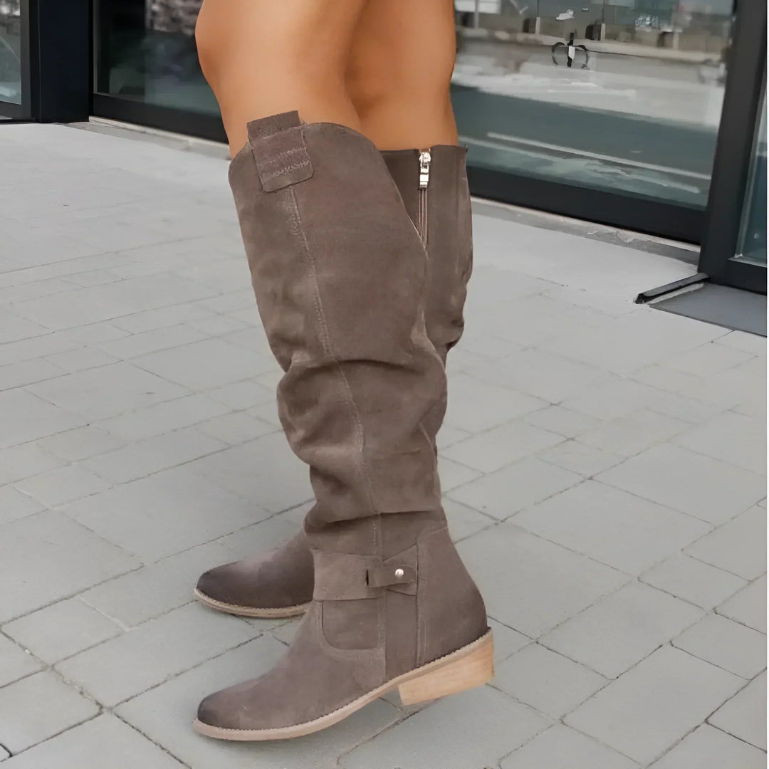 Women's slouch knee-high boots with low block heel and ankle strap details