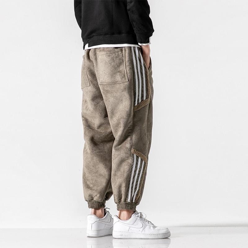 Fleece jogger pants with striped side panels and ribbed cuffs