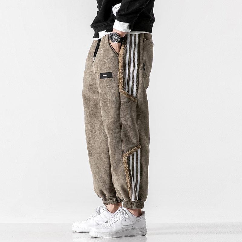 Fleece jogger pants with striped side panels and ribbed cuffs