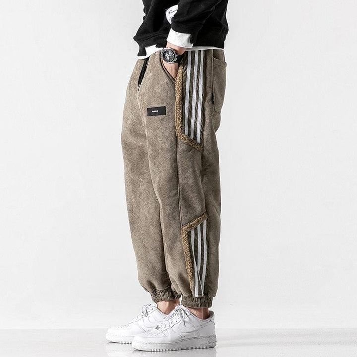 Fleece jogger pants with striped side panels and ribbed cuffs