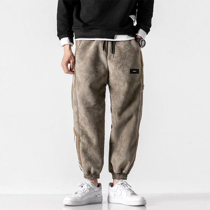Fleece jogger pants with striped side panels and ribbed cuffs