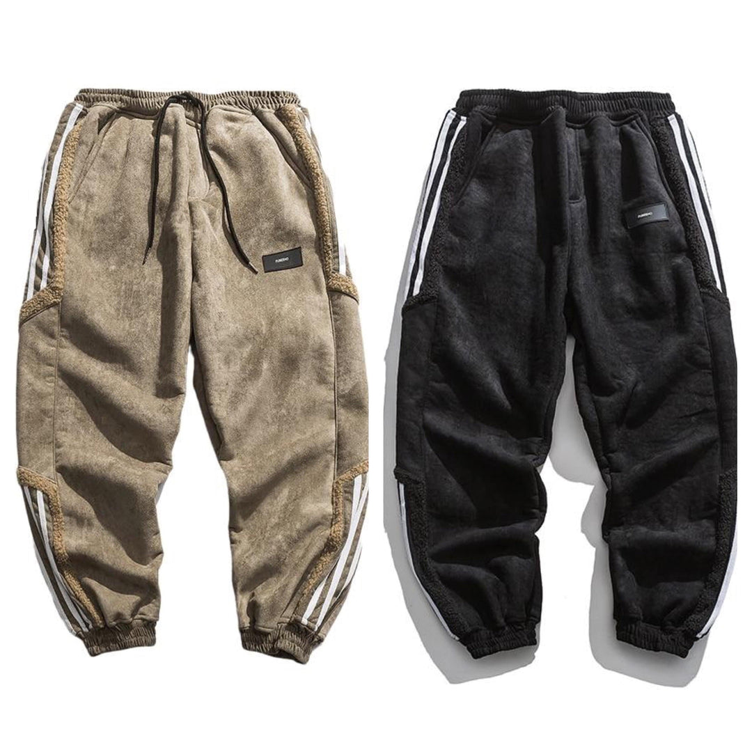 Fleece jogger pants with striped side panels and ribbed cuffs
