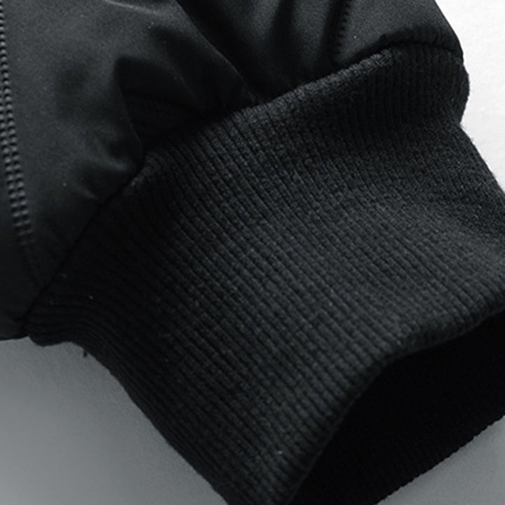 Men's quilted jacket with stand collar, geometric pattern and zipped pockets