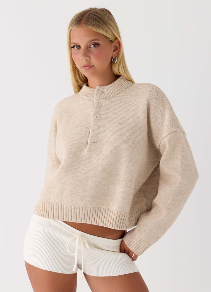 Women's beige button-up mock neck jumper with long sleeves and ribbed trims