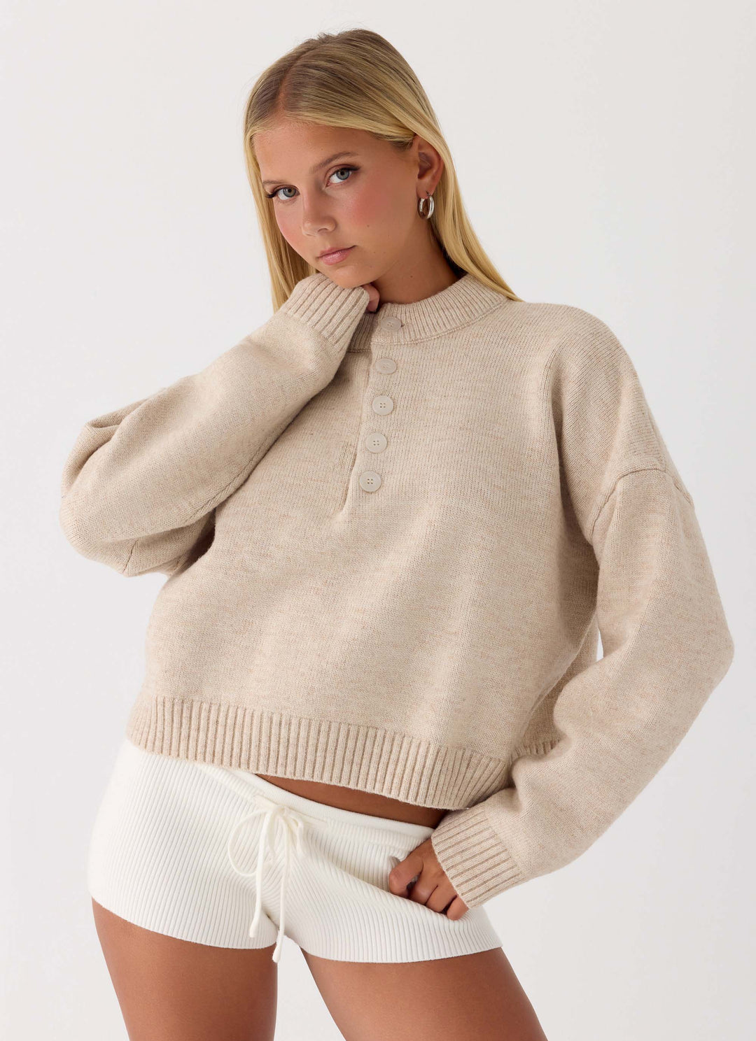 Women's beige button-up mock neck jumper with long sleeves and ribbed trims