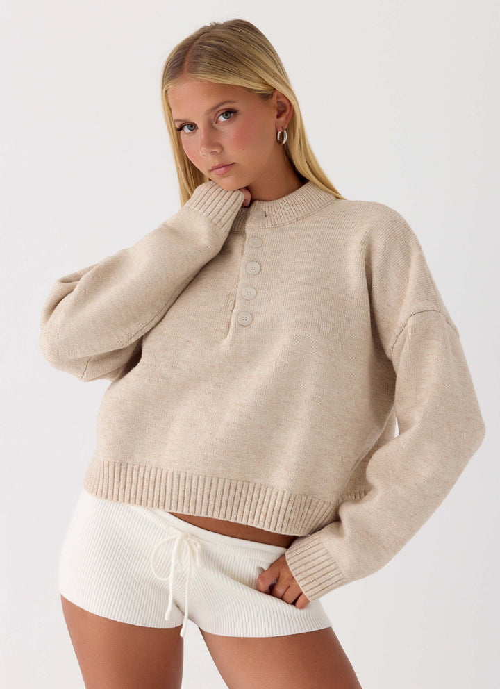 Women's beige button-up mock neck jumper with long sleeves and ribbed trims