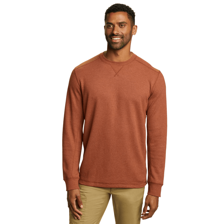 Men's long sleeve crew neck top with fine ribbed texture and cuffed sleeves