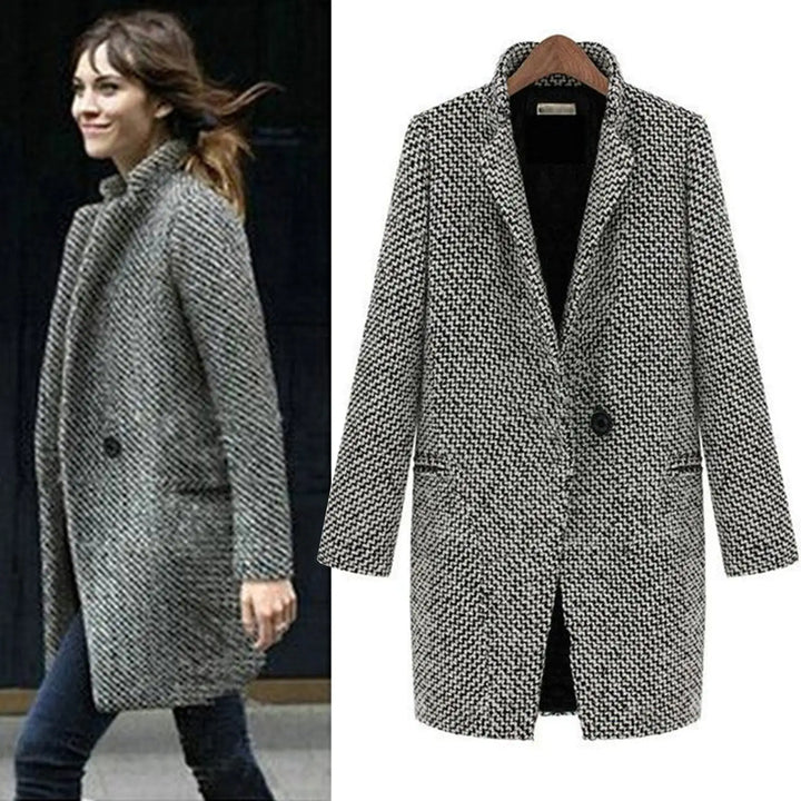 Women's black and white houndstooth long coat with notched lapels and button fastening