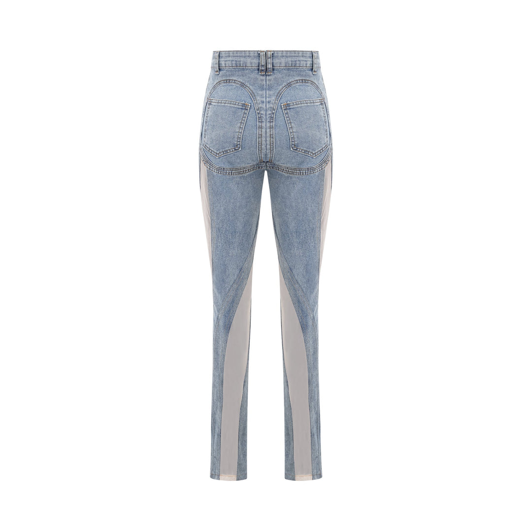 Women's blue high-rise jeans with sheer leg panels