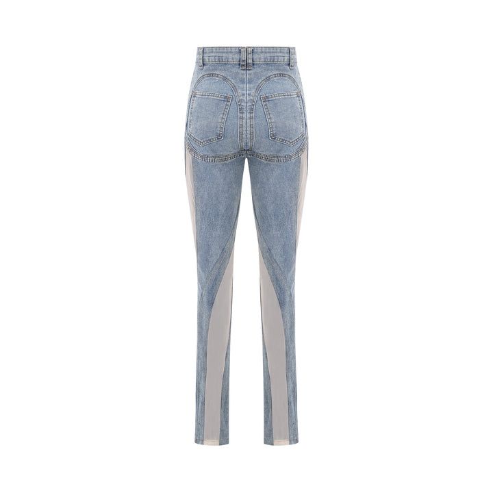 Women's blue high-rise jeans with sheer leg panels
