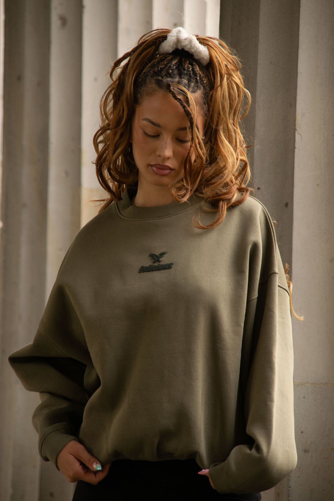 Women's green crewneck sweatshirt with tonal chest logo and ribbed trims