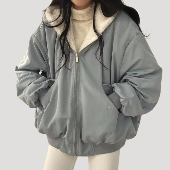 Women's padded jacket with high collar, zip front and flap pockets