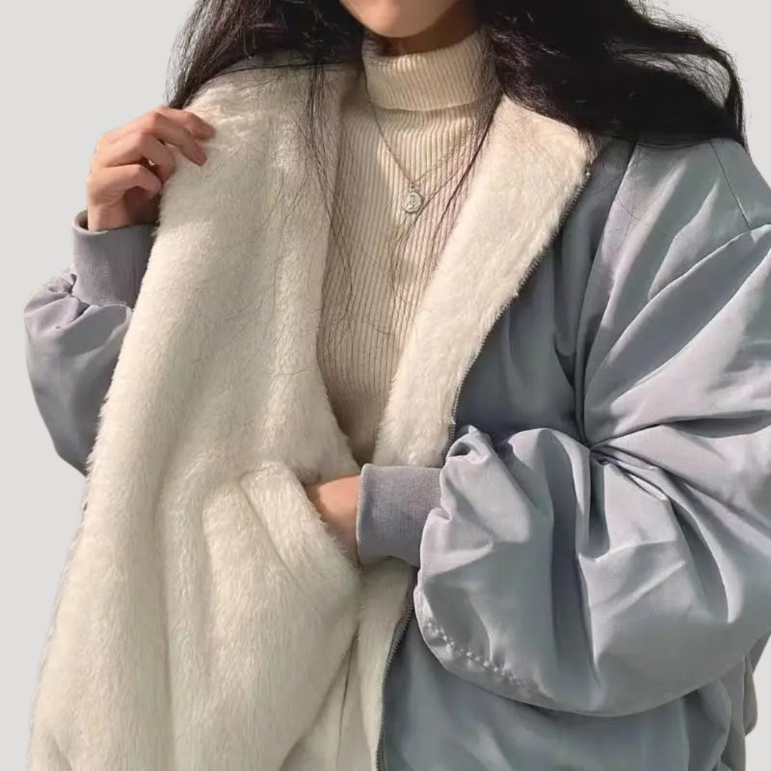 Women's padded jacket with high collar, zip front and flap pockets