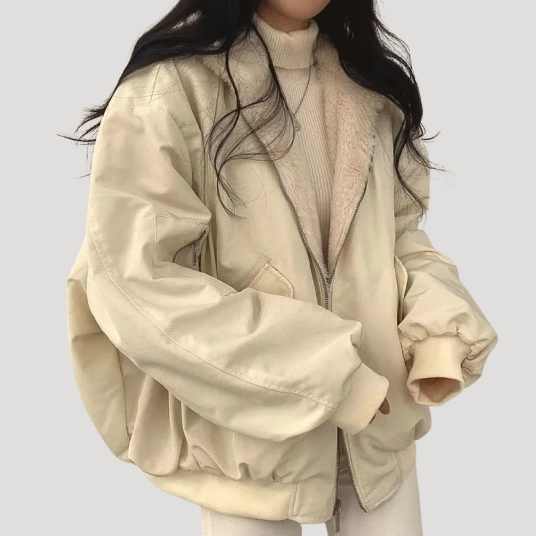 Women's padded jacket with high collar, zip front and flap pockets