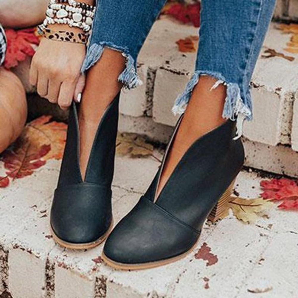 Women's pointed-toe ankle boots with block heels and horizontal upper detail