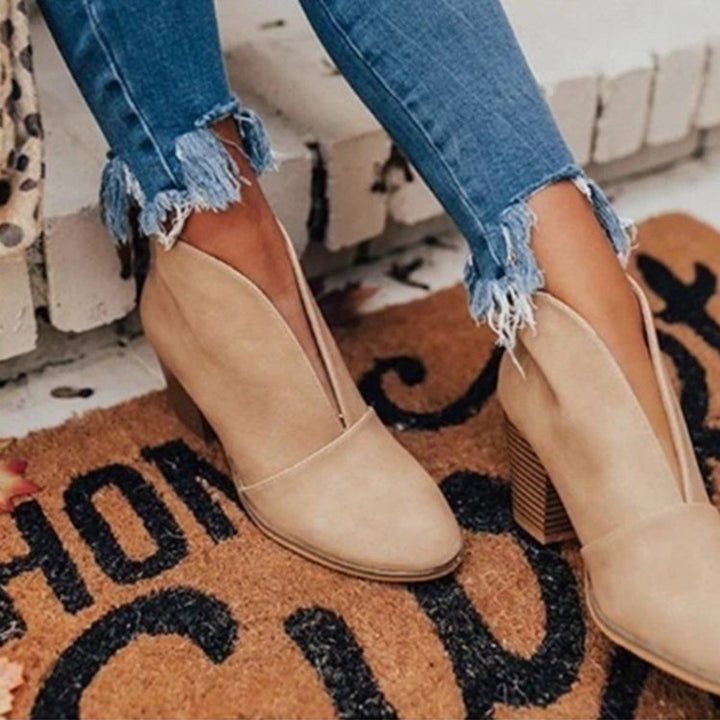 Women's pointed-toe ankle boots with block heels and horizontal upper detail