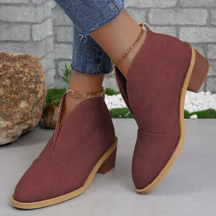 Women's pointed-toe ankle boots with block heels and horizontal upper detail