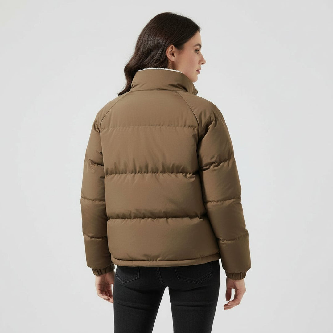 Women's quilted hooded jacket with zip fastening and contrasting lining
