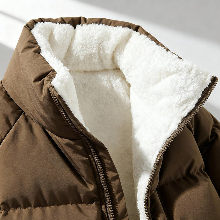 Women's quilted hooded jacket with zip fastening and contrasting lining
