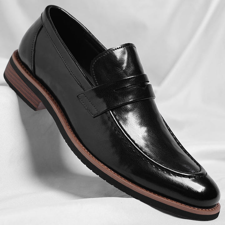 Men's polished penny loafers with rounded toes, low heels and layered soles
