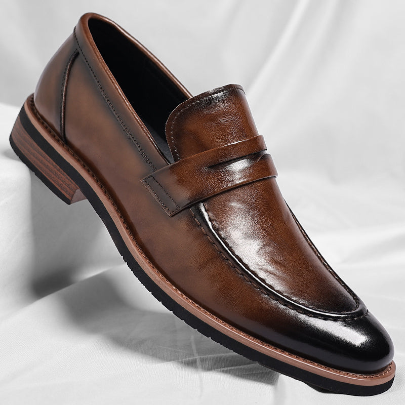 Men's polished penny loafers with rounded toes, low heels and layered soles