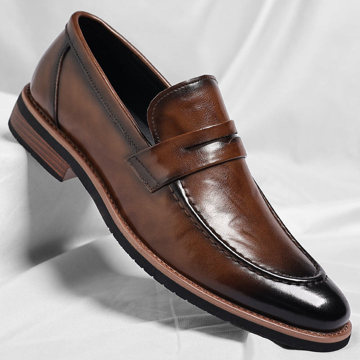 Men's polished penny loafers with rounded toes, low heels and layered soles